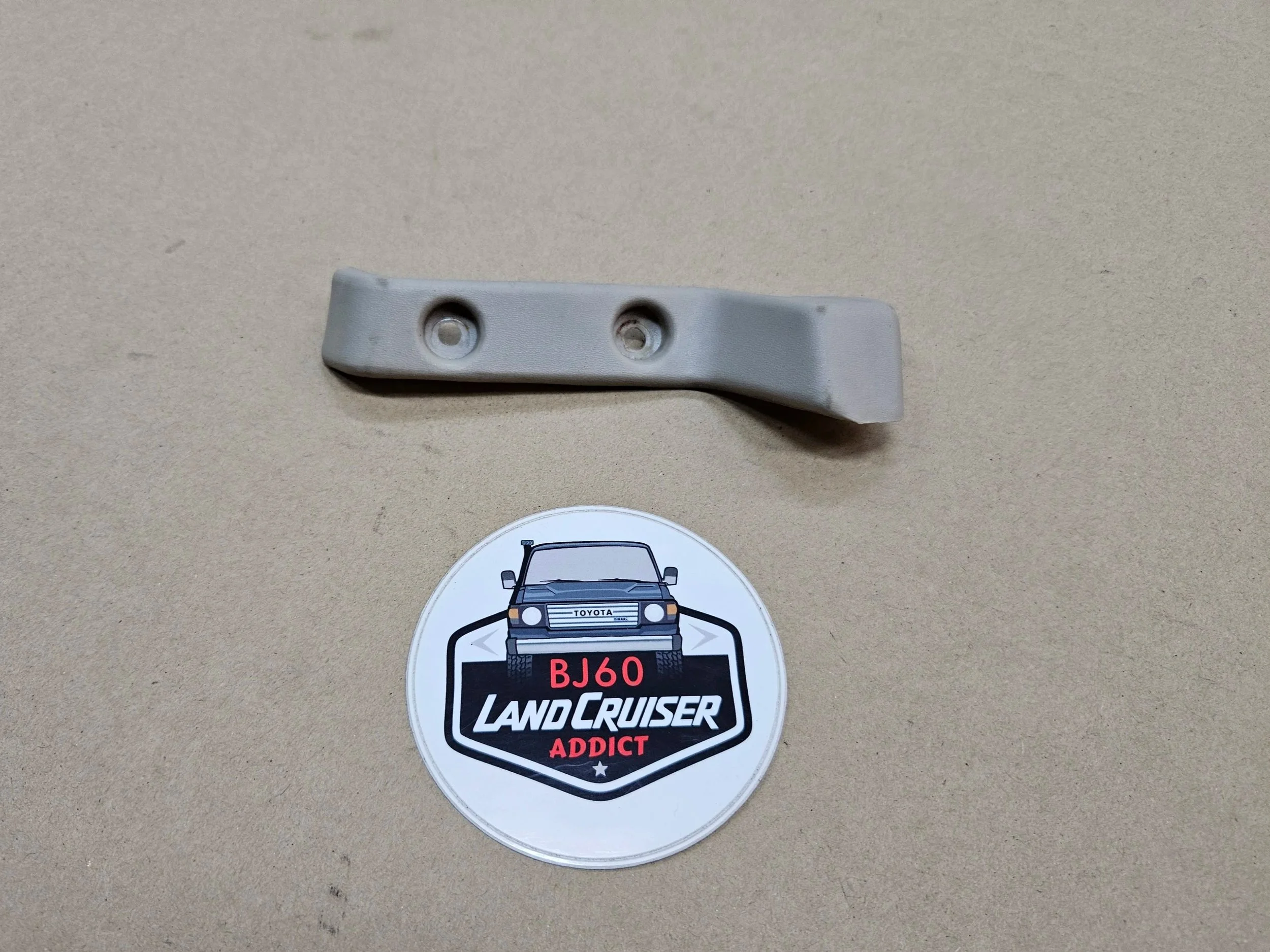 60-series rear headliner trim ivory right-hand side.