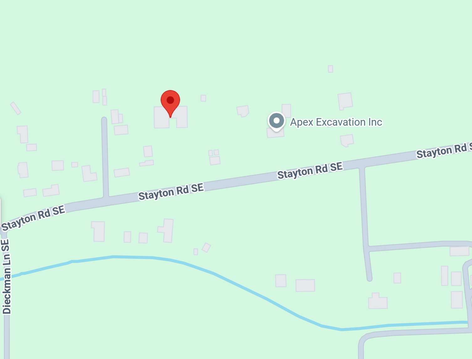 Map showing a location near Apex Excava tion Inc on Stayton Rd SE, with a marker indicating a specific property, surrounded by scattered houses and roads in a green area.