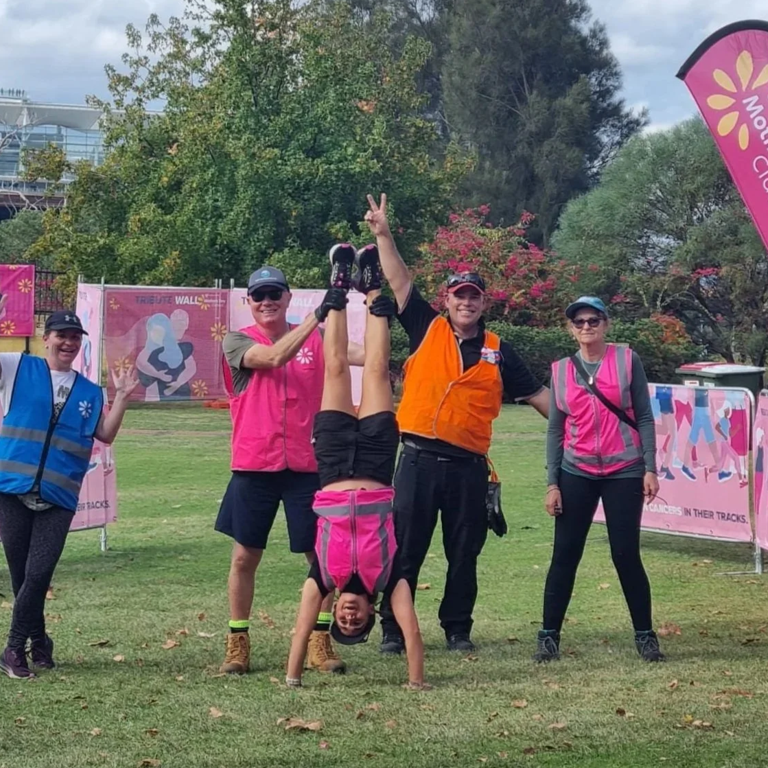 Finish line handstands at Mother's Day Classic