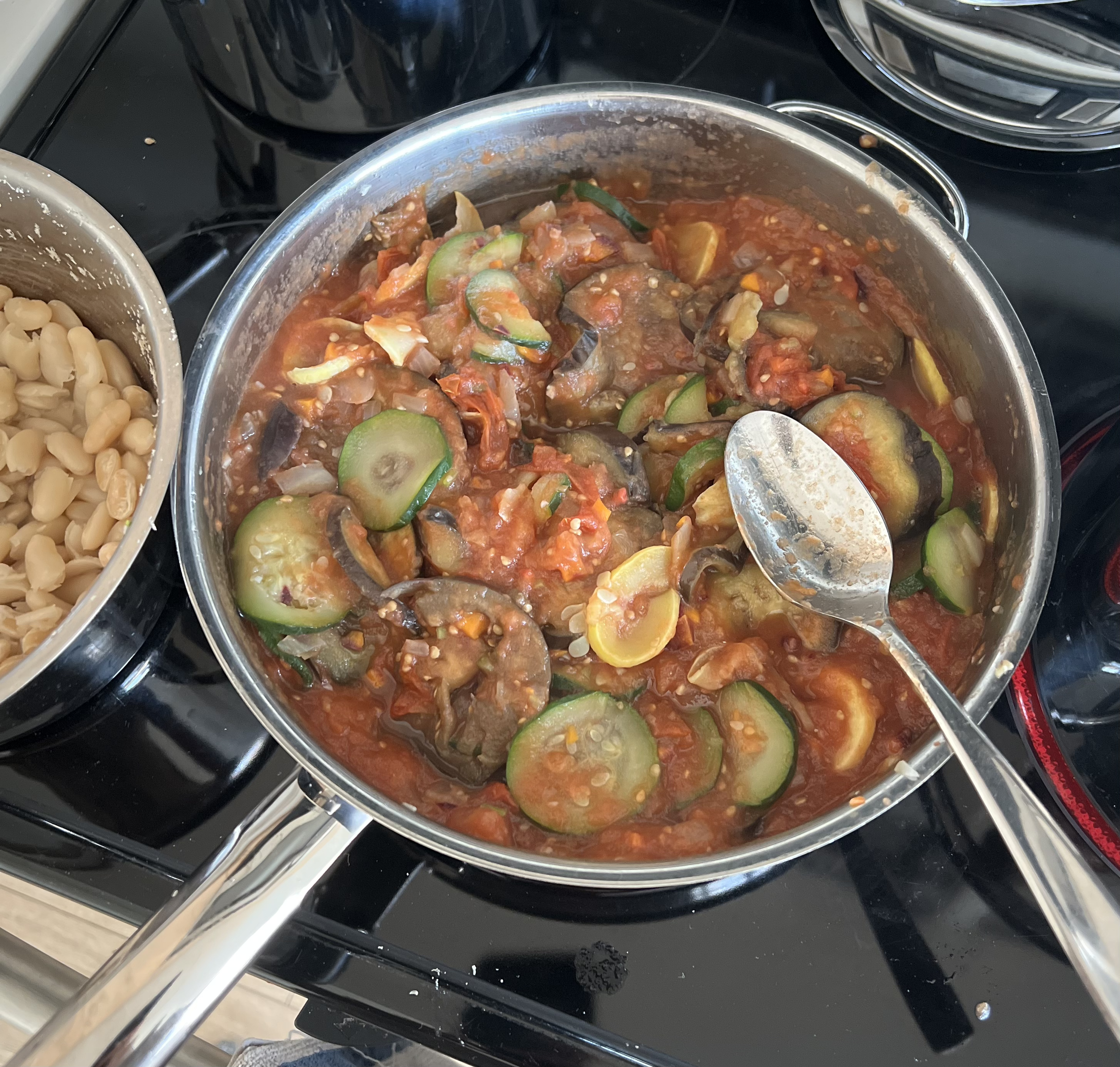 Ratatouille and cannellini beans (pictured on the left side of image)