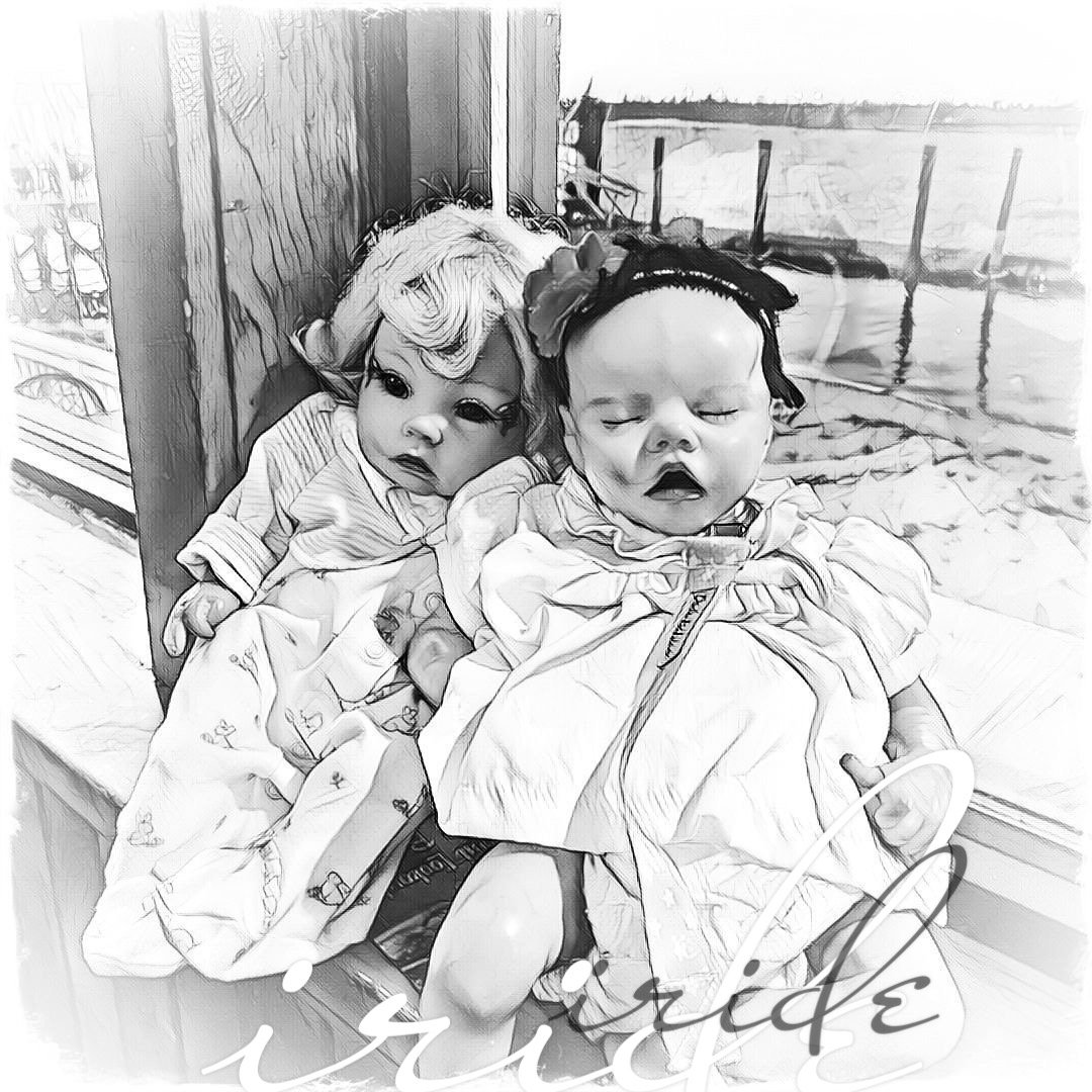 Two young children sitting close together near a window, one resting her head on the other, in black and white with the word 'grateful' written in cursive at the bottom.