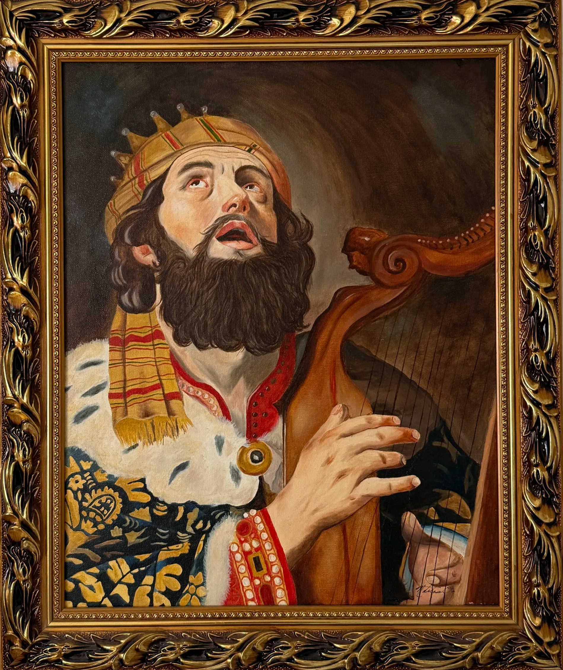 Painting of a man with long dark hair, a full beard, wearing a crown with red, green, and gold accents, and dressed in regal robes with patterned gold and black fabric, holding a wooden harp.