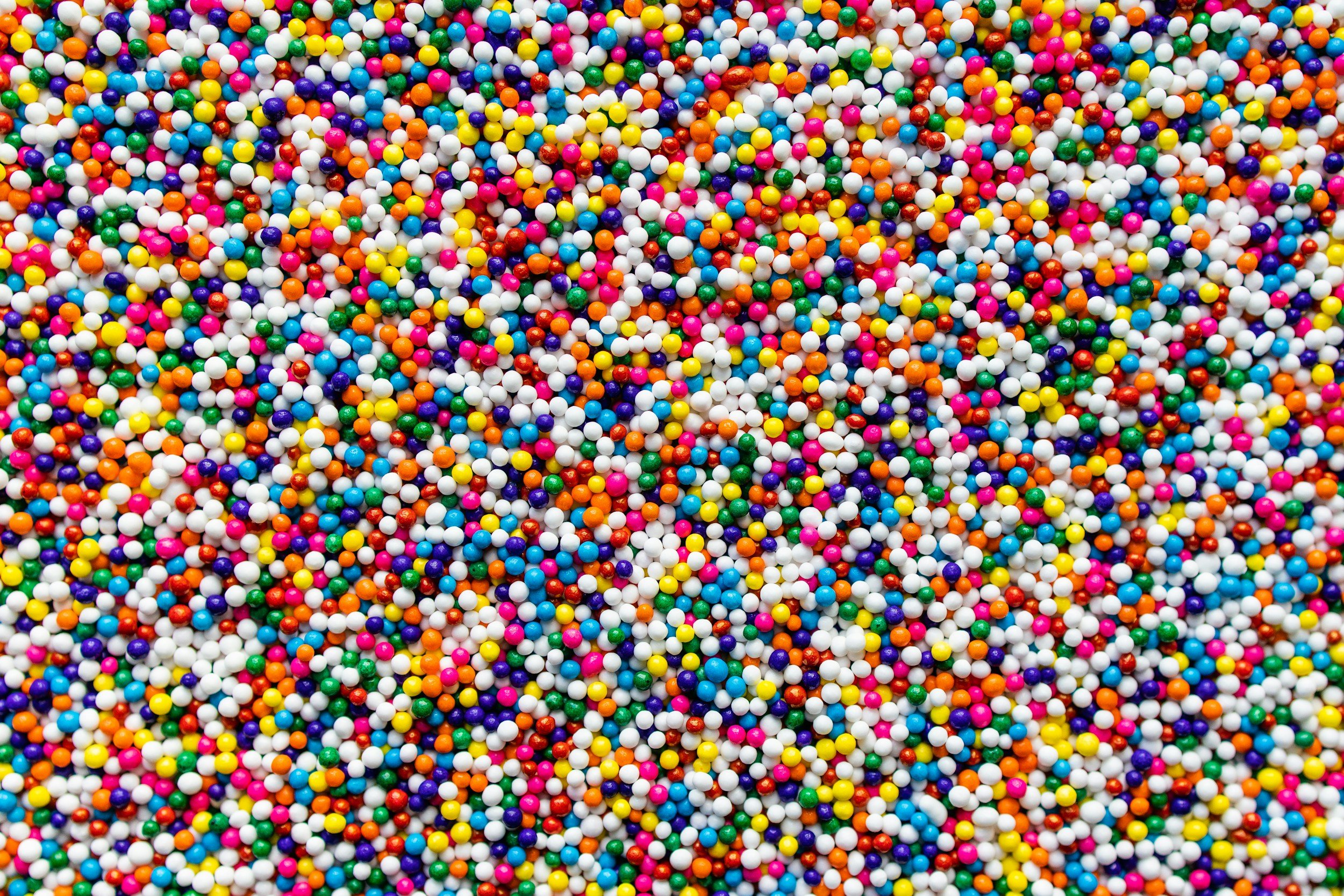 Mini Dot Cakes: individual cakes dipped in sprinkles, perfect for parties, showers, and gifting