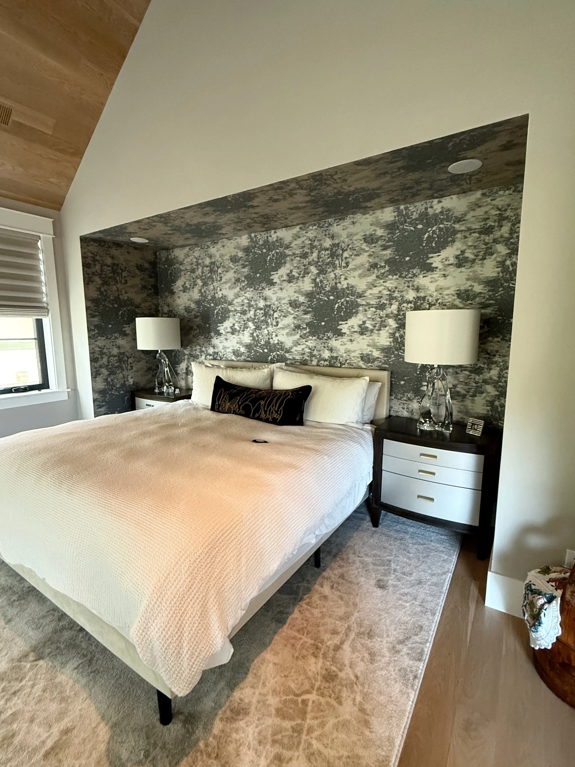 Textured wallpaper accent wall installation in modern bedroom in Denver, CO