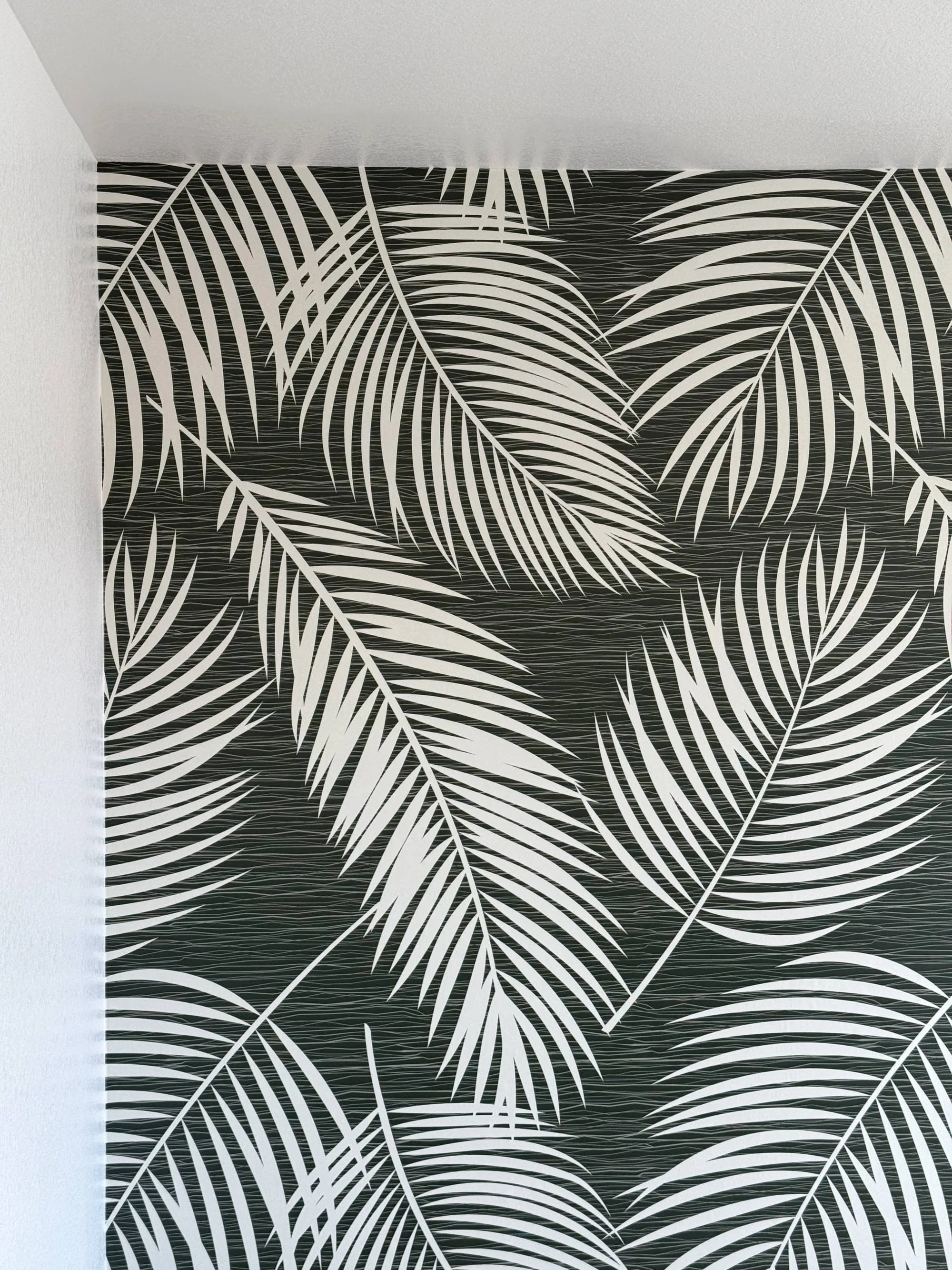 Palm leaf wallpaper accent wall installation in Denver, Colorado