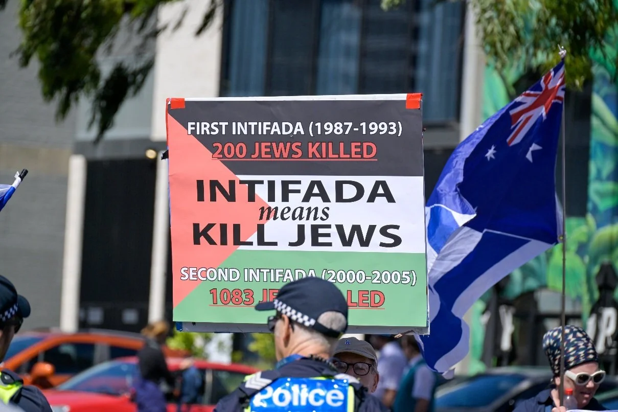 Documentary photograph taken during the Israeli President’s visit to Melbourne on 12 February, capturing protests in Southbank and the CBD, police security measures, and street-level tensions. | photo by Farhad Rajabali