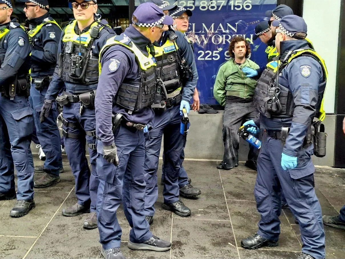Editorial photograph from the Marches for Australia protests in Melbourne, documenting public demonstrations and civic expression. / photo by Farhad Rajabali | Artssie