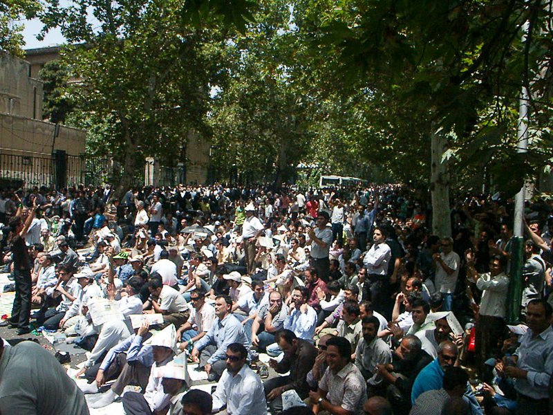 Editorial photograph from the Green Movement protests in Iran during 2009–2010, documenting public demonstrations, civic resistance, and everyday life under heightened security conditions. Part of a long-form documentary project by photographer Farha