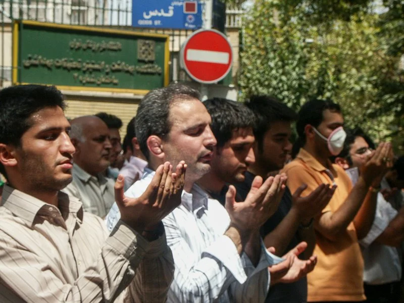 Editorial photograph from the Green Movement protests in Iran during 2009–2010, documenting public demonstrations, civic resistance, and everyday life under heightened security conditions. Part of a long-form documentary project by photographer Farha