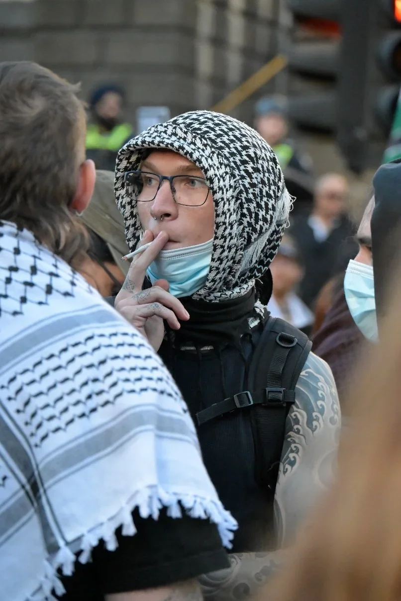 Documentary photograph taken during the Israeli President’s visit to Melbourne on 12 February 2026, capturing protests in Southbank and the CBD, police security measures, and street-level tensions. Photo by Farhad Rajabali | Artssie