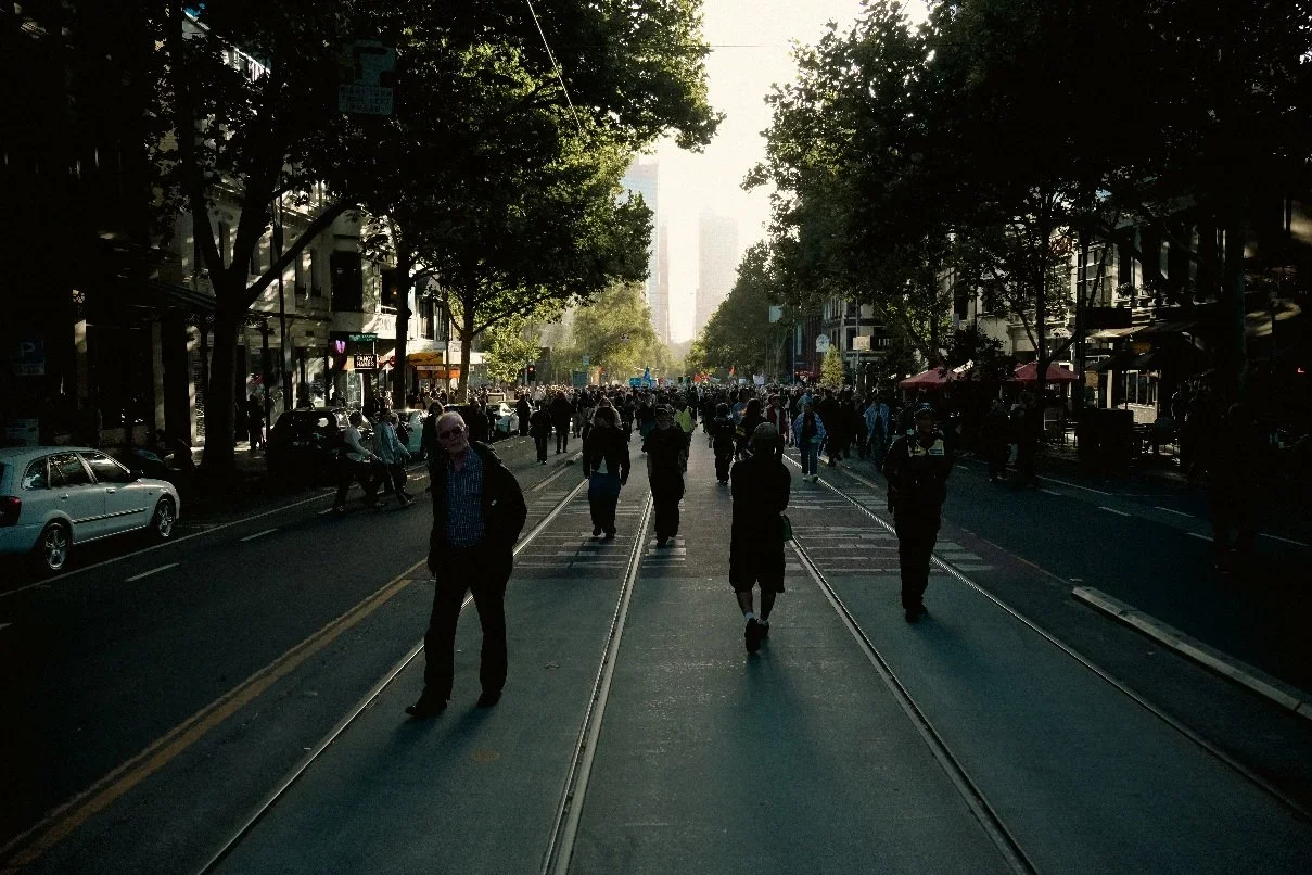 Documentary photograph taken during the Israeli President’s visit to Melbourne on 12 February 2026, capturing protests in Southbank and the CBD, police security measures, and street-level tensions. Photo by Farhad Rajabali | Artssie