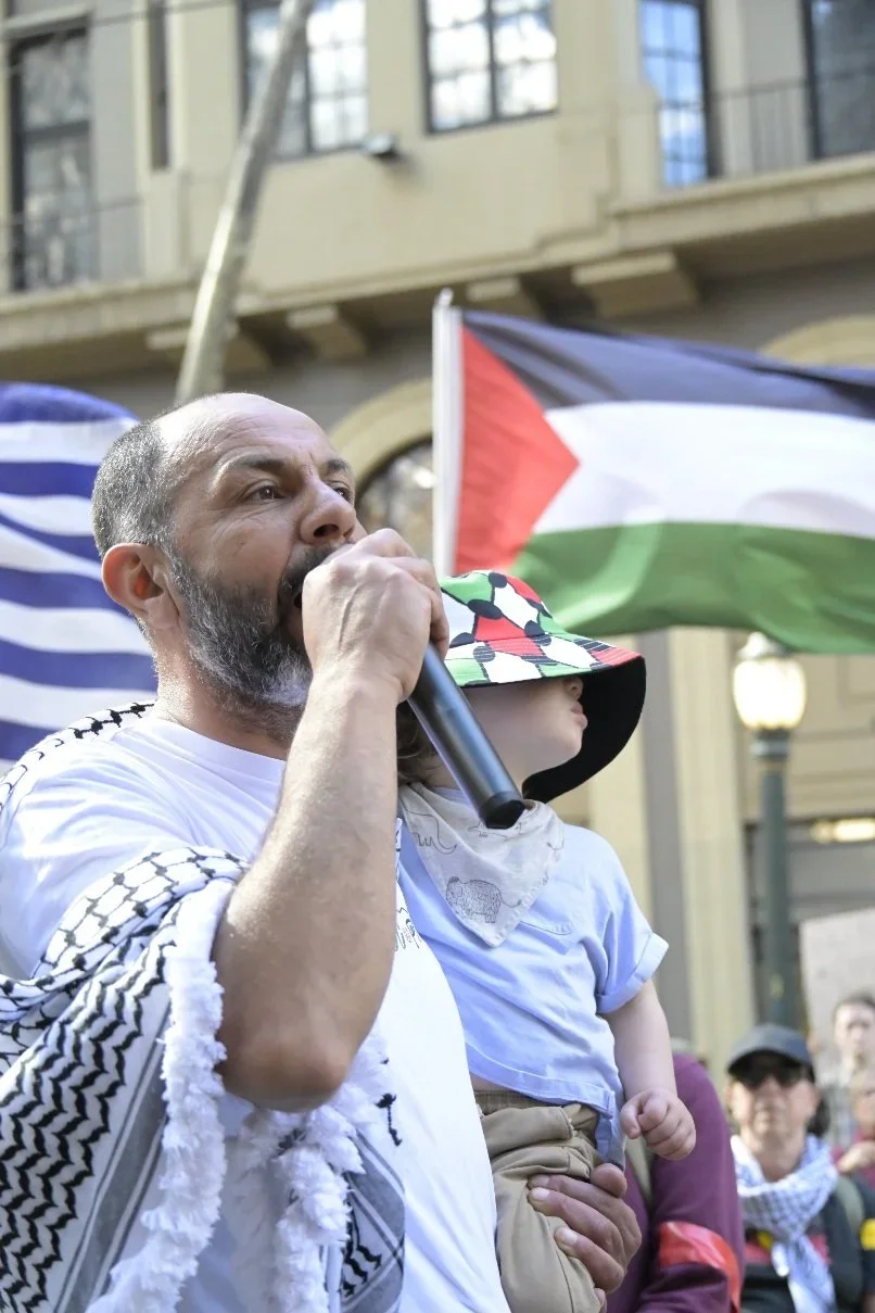 Editorial photograph from pro-Palestine demonstrations held in Melbourne during September–October 2025, documenting public protest, civic participation, and collective expression in urban space. Part of a long-form documentary project by photographer