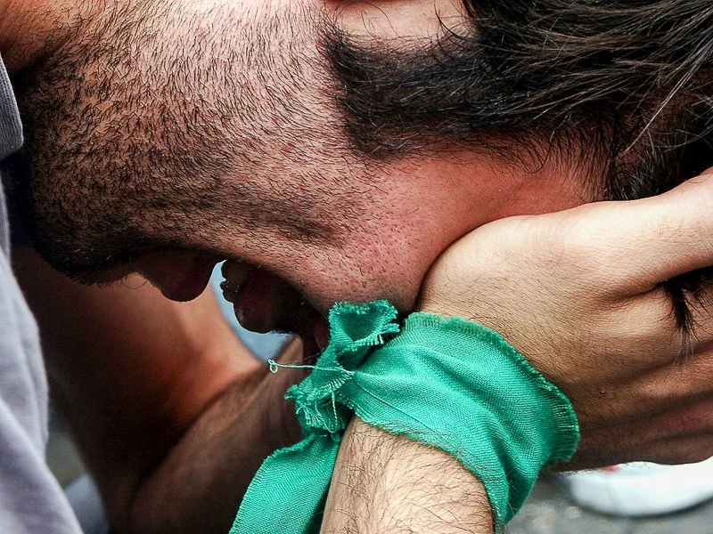 Editorial photograph from the Green Movement protests in Iran during 2009–2010, documenting public demonstrations, civic resistance, and everyday life under heightened security conditions. Part of a long-form documentary project by photographer Farha