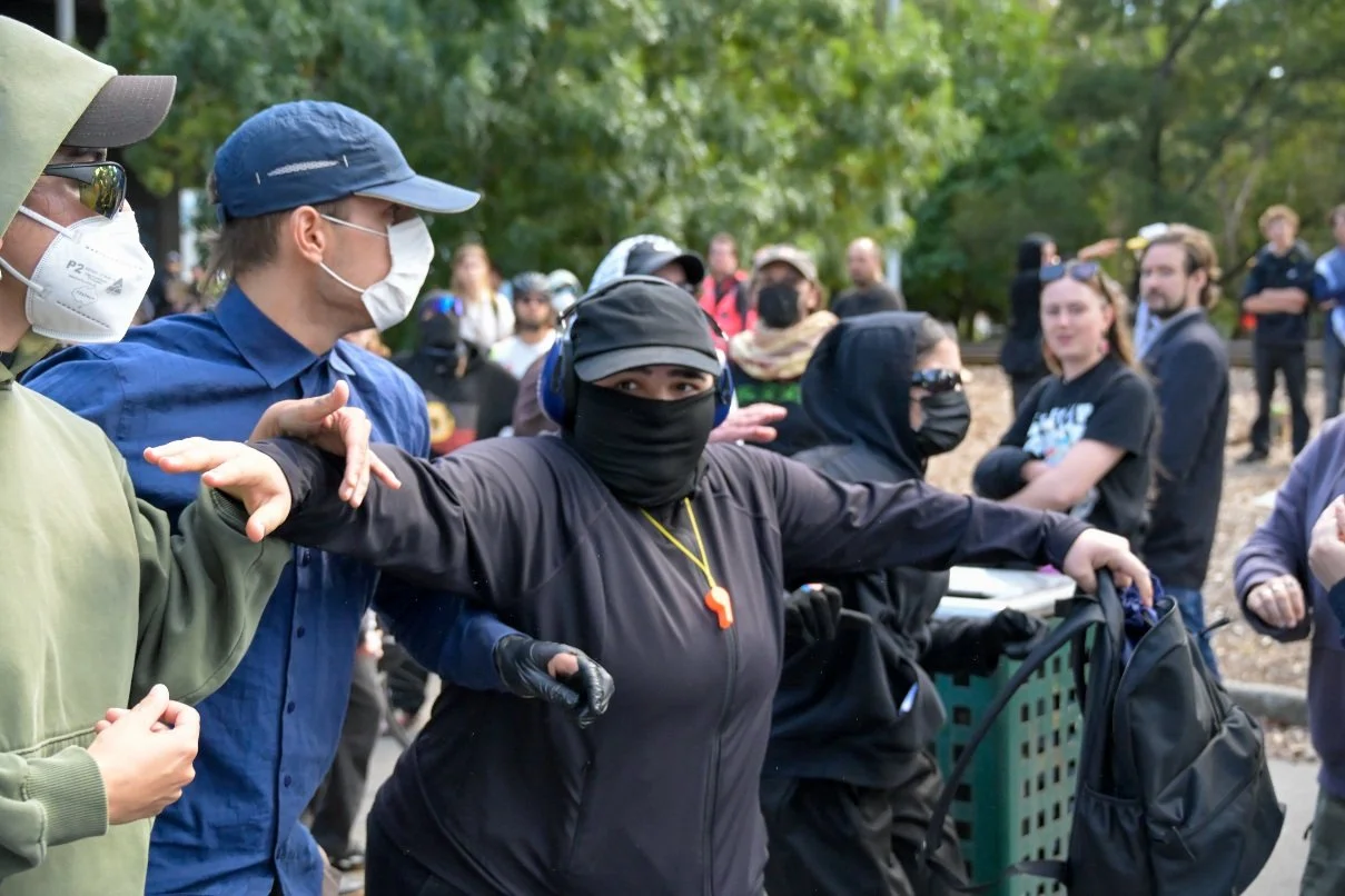 Documentary photograph taken during the Israeli President’s visit to Melbourne on 12 February, capturing protests in Southbank and the CBD, police security measures, and street-level tensions. | photo by Farhad Rajabali