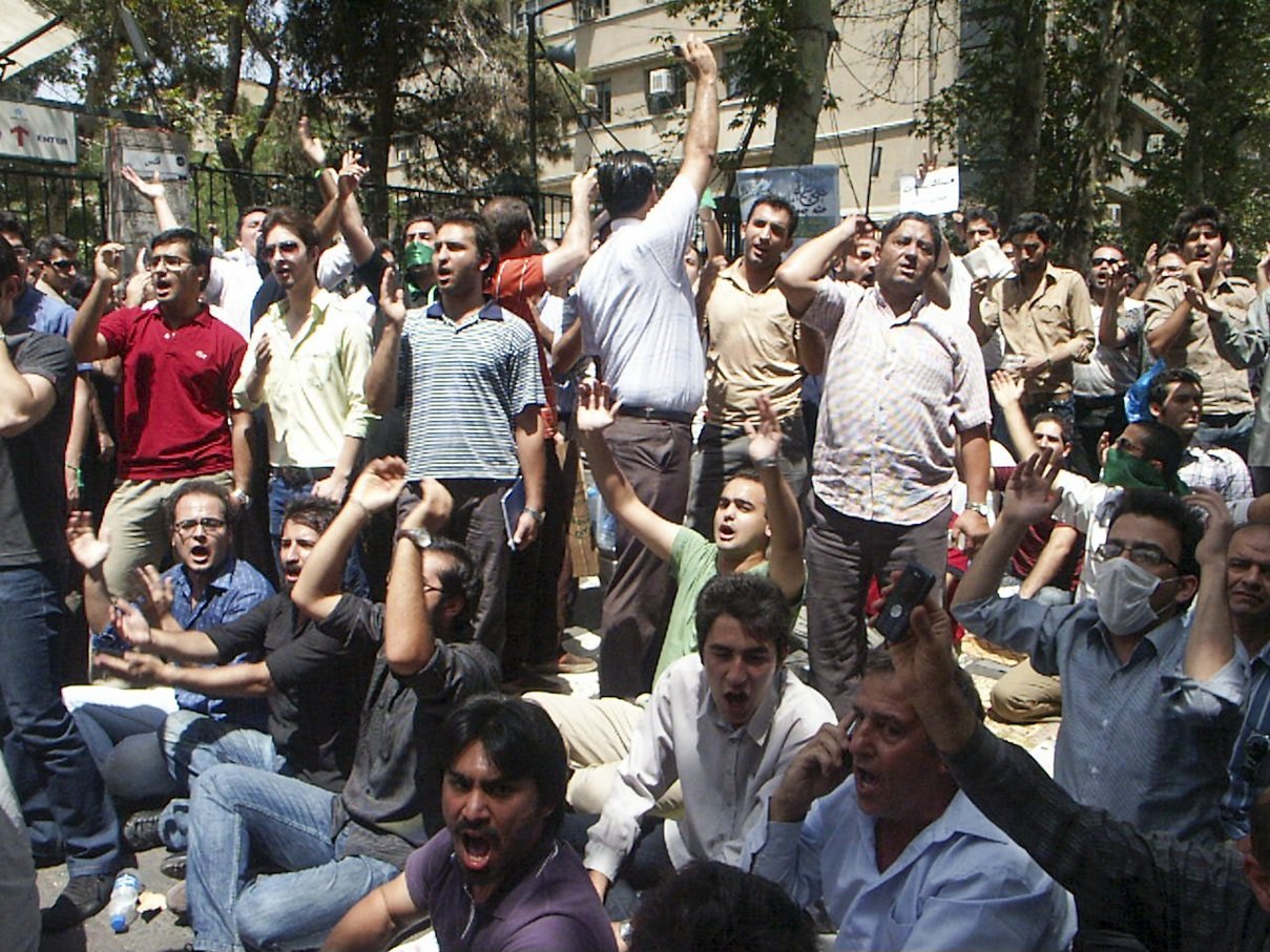 This image is part of the Green Movement documentary series, recorded during the 2009 protests in Tehran, Iran. The project documents everyday scenes and public demonstrations, reflecting resilience, collective presence, and civilian life during a si