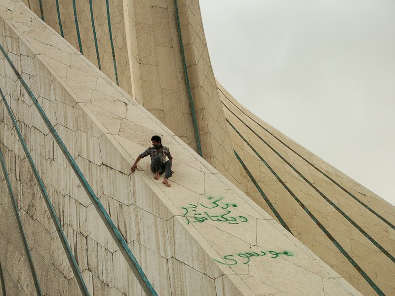 Editorial photograph from the Green Movement protests in Iran during 2009–2010, documenting public demonstrations, civic resistance, and everyday life under heightened security conditions. Part of a long-form documentary project by photographer Farha