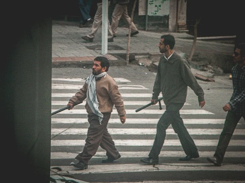 Editorial photograph from the Green Movement protests in Iran during 2009–2010, documenting public demonstrations, civic resistance, and everyday life under heightened security conditions. Part of a long-form documentary project by photographer Farha