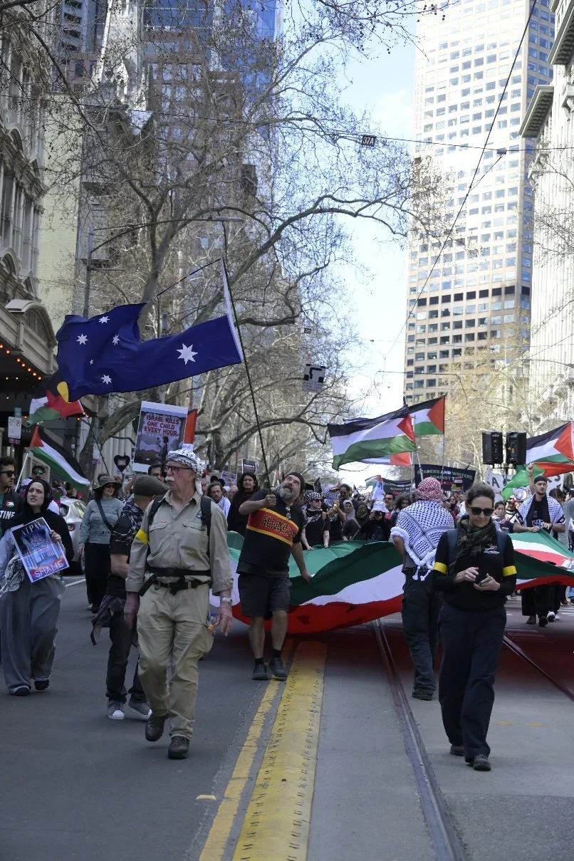 Editorial photograph from pro-Palestine demonstrations held in Melbourne during September–October 2025, documenting public protest, civic participation, and collective expression in urban space. Part of a long-form documentary project by photographer