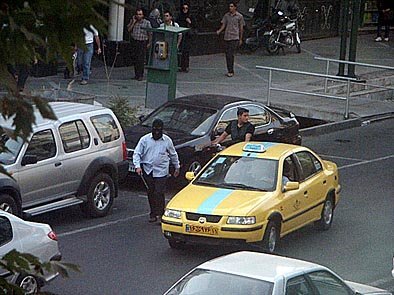 This image is part of the Green Movement documentary series, recorded during the 2009 protests in Tehran, Iran. The project documents everyday scenes and public demonstrations, reflecting resilience, collective presence, and civilian life during a si