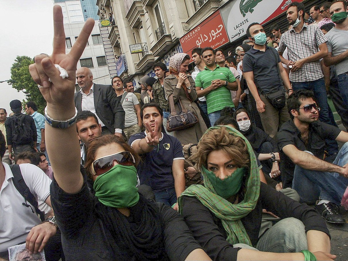 This image is part of the Green Movement documentary series, recorded during the 2009 protests in Tehran, Iran. The project documents everyday scenes and public demonstrations, reflecting resilience, collective presence, and civilian life during a si