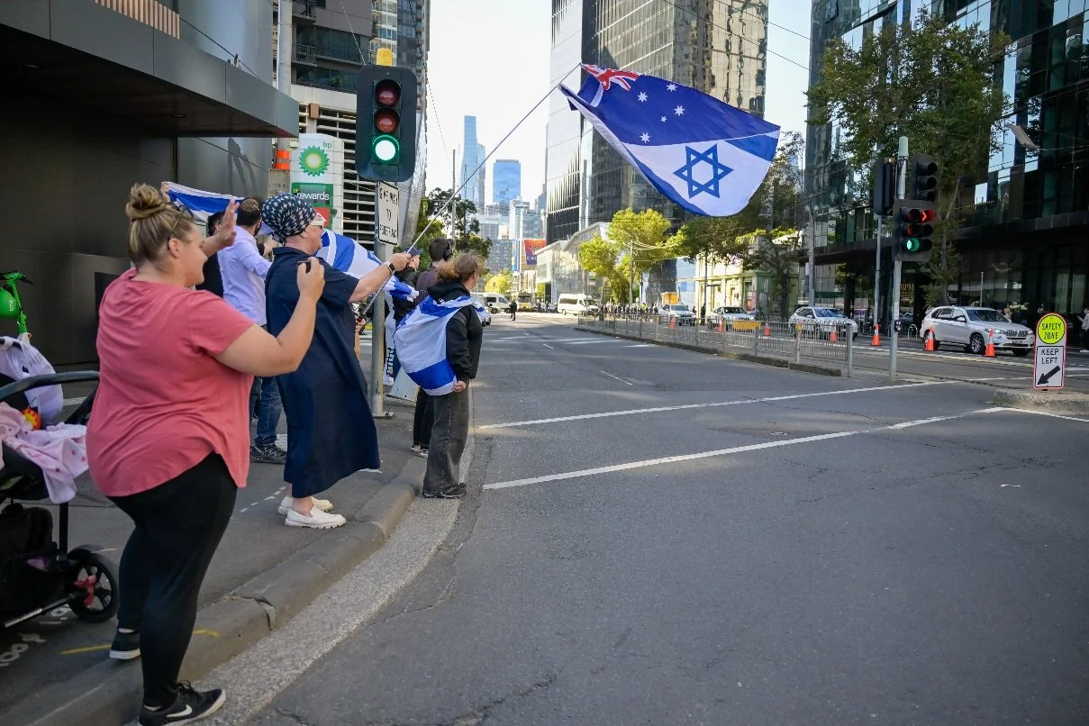 Documentary photograph taken during the Israeli President’s visit to Melbourne on 12 February, capturing protests in Southbank and the CBD, police security measures, and street-level tensions. | photo by Farhad Rajabali