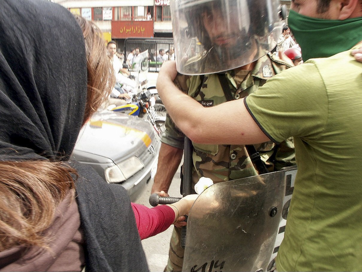 This image is part of the Green Movement documentary series, recorded during the 2009 protests in Tehran, Iran. The project documents everyday scenes and public demonstrations, reflecting resilience, collective presence, and civilian life during a si