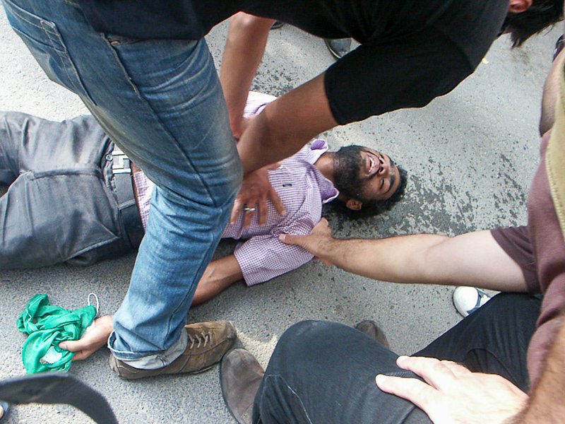 Editorial photograph from the Green Movement protests in Iran during 2009–2010, documenting public demonstrations, civic resistance, and everyday life under heightened security conditions. Part of a long-form documentary project by photographer Farha