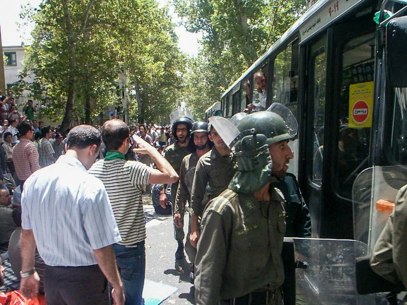 Editorial photograph from the Green Movement protests in Iran during 2009–2010, documenting public demonstrations, civic resistance, and everyday life under heightened security conditions. Part of a long-form documentary project by photographer Farha