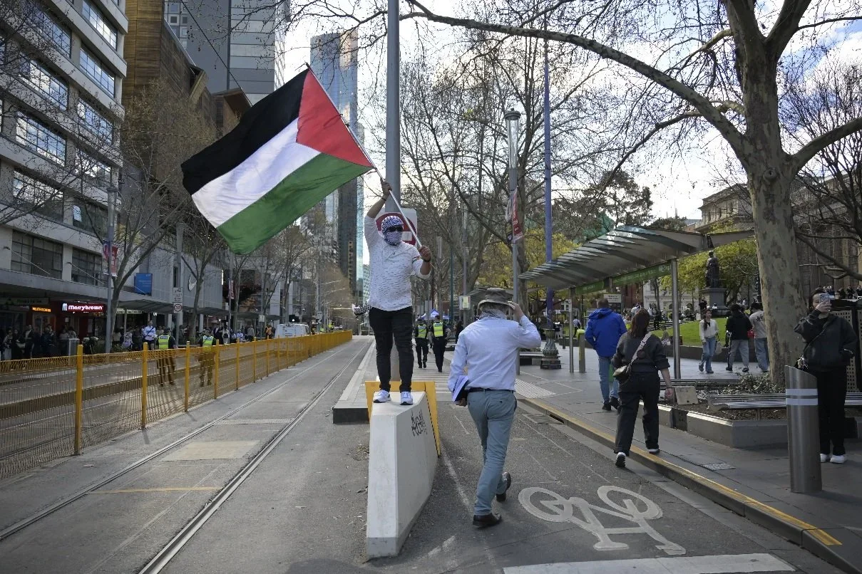 Editorial photograph from pro-Palestine demonstrations held in Melbourne during September–October 2025, documenting public protest, civic participation, and collective expression in urban space. Part of a long-form documentary project by photographer