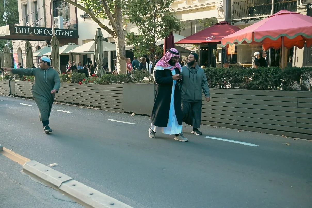 Documentary photograph taken during the Israeli President’s visit to Melbourne on 12 February, capturing protests in Southbank and the CBD, police security measures, and street-level tensions. | photo by Farhad Rajabali