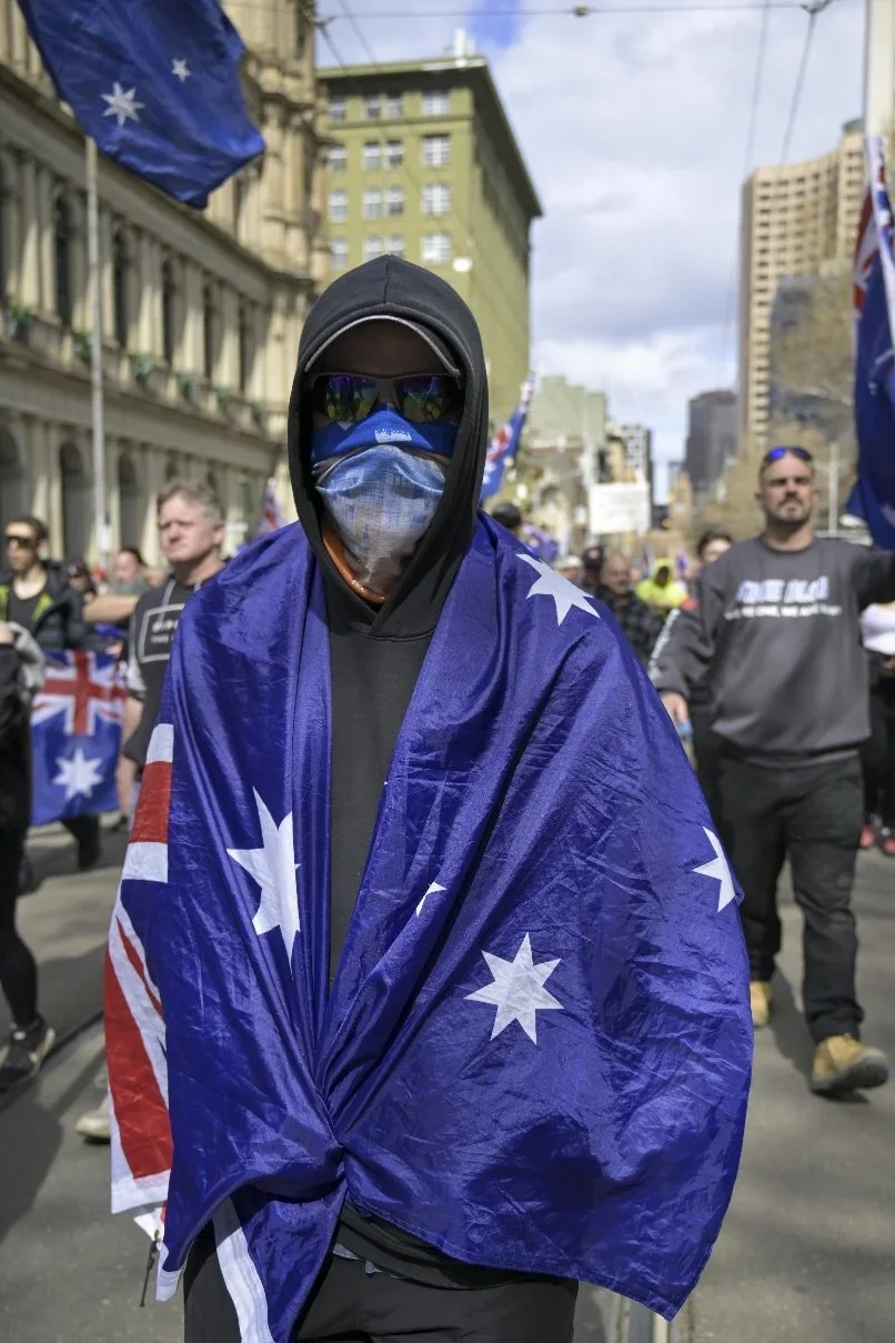 Editorial photograph from the Marches for Australia protests in Melbourne, documenting public demonstrations and civic expression. / photo by Farhad Rajabali | Artssie