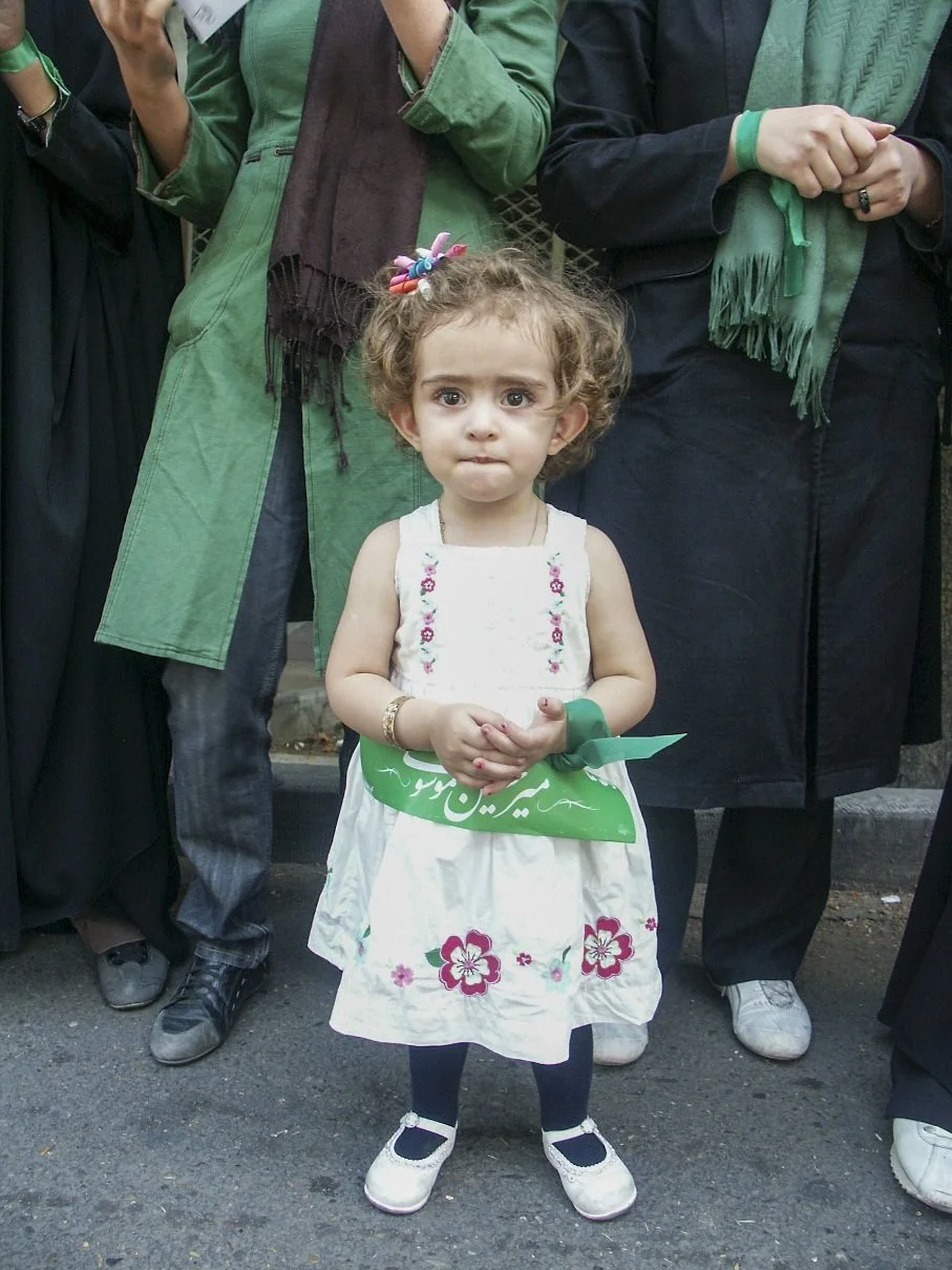 This image is part of the Green Movement documentary series, recorded during the 2009 protests in Tehran, Iran. The project documents everyday scenes and public demonstrations, reflecting resilience, collective presence, and civilian life during a si