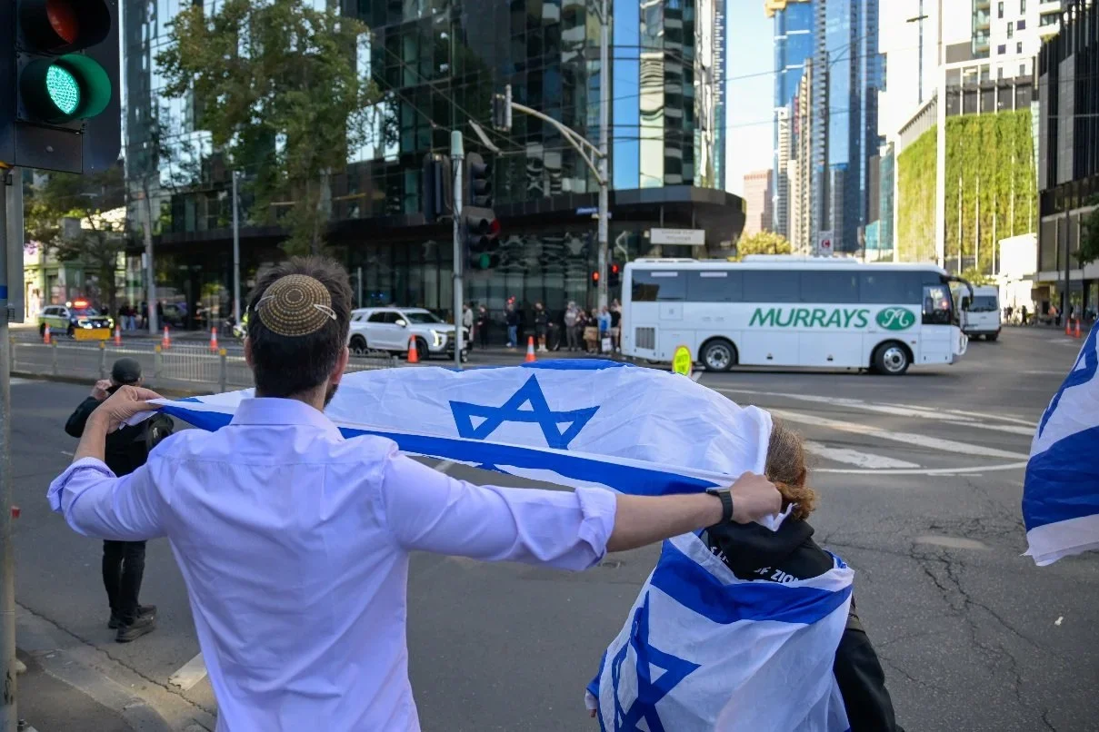 Documentary photograph taken during the Israeli President’s visit to Melbourne on 12 February 2026, capturing protests in Southbank and the CBD, police security measures, and street-level tensions. Photo by Farhad Rajabali | Artssie