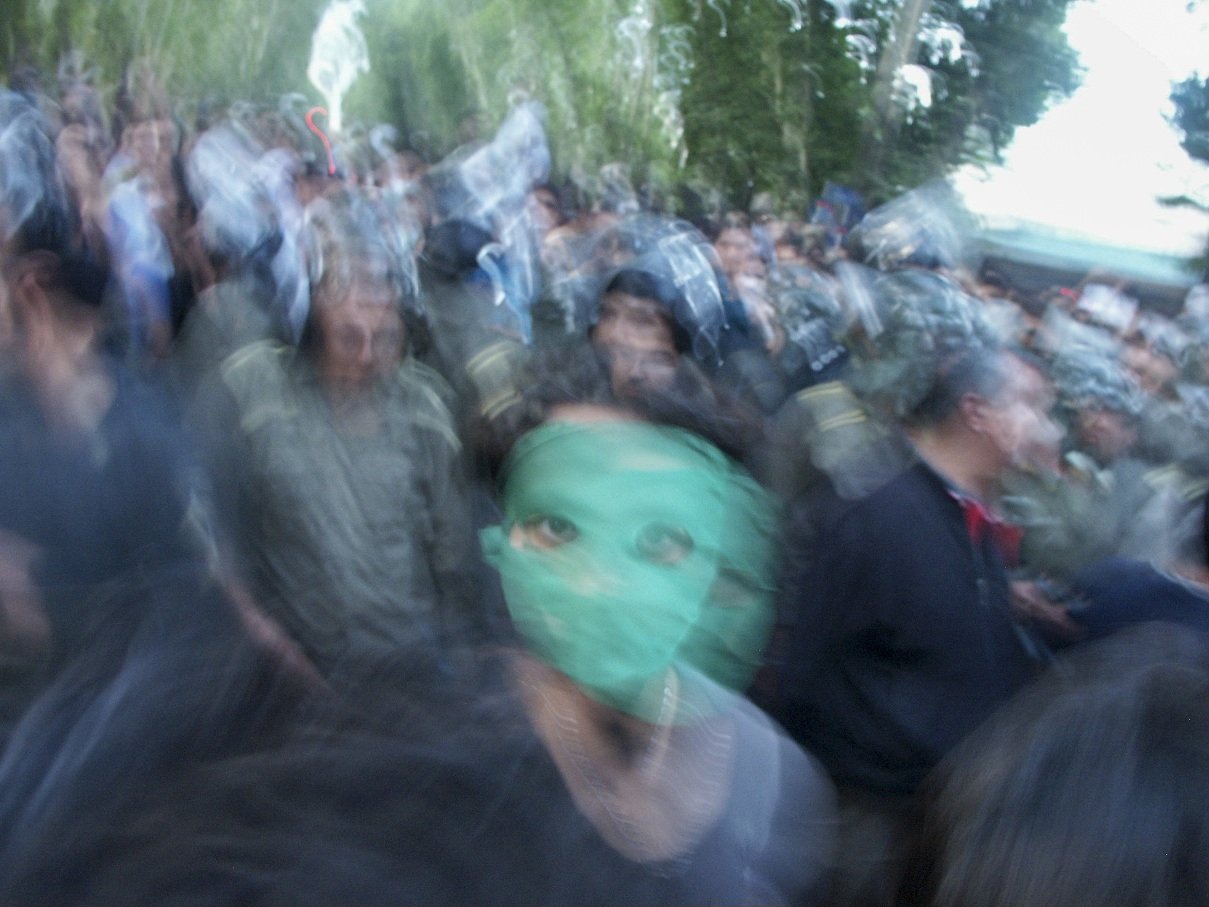 This image is part of the Green Movement documentary series, recorded during the 2009 protests in Tehran, Iran. The project documents everyday scenes and public demonstrations, reflecting resilience, collective presence, and civilian life during a si
