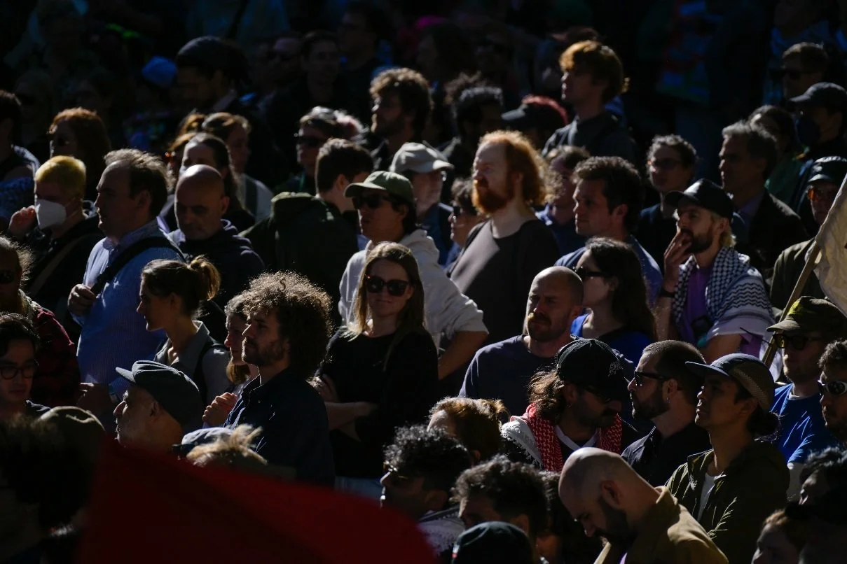 Documentary photograph taken during the Israeli President’s visit to Melbourne on 12 February, capturing protests in Southbank and the CBD, police security measures, and street-level tensions. | photo by Farhad Rajabali