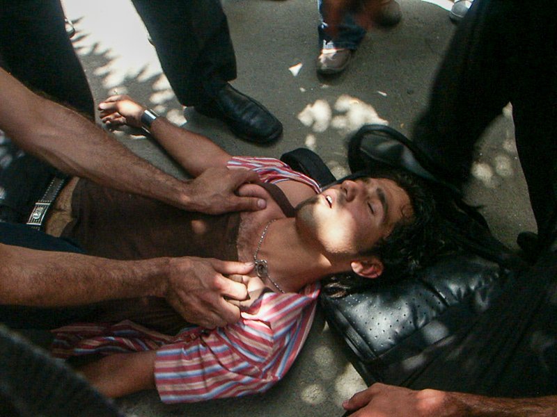Editorial photograph from the Green Movement protests in Iran during 2009–2010, documenting public demonstrations, civic resistance, and everyday life under heightened security conditions. Part of a long-form documentary project by photographer Farha