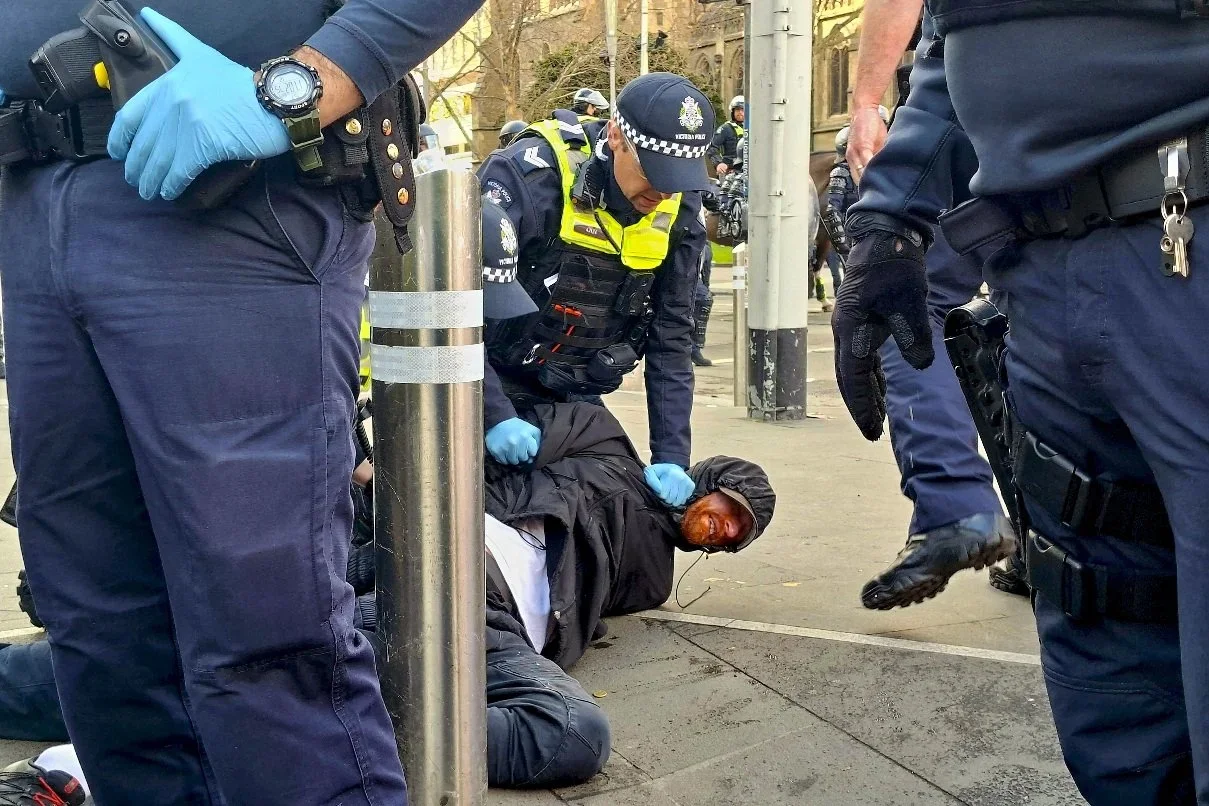Editorial photograph from the Marches for Australia protests in Melbourne, documenting public demonstrations and civic expression. / photo by Farhad Rajabali | Artssie