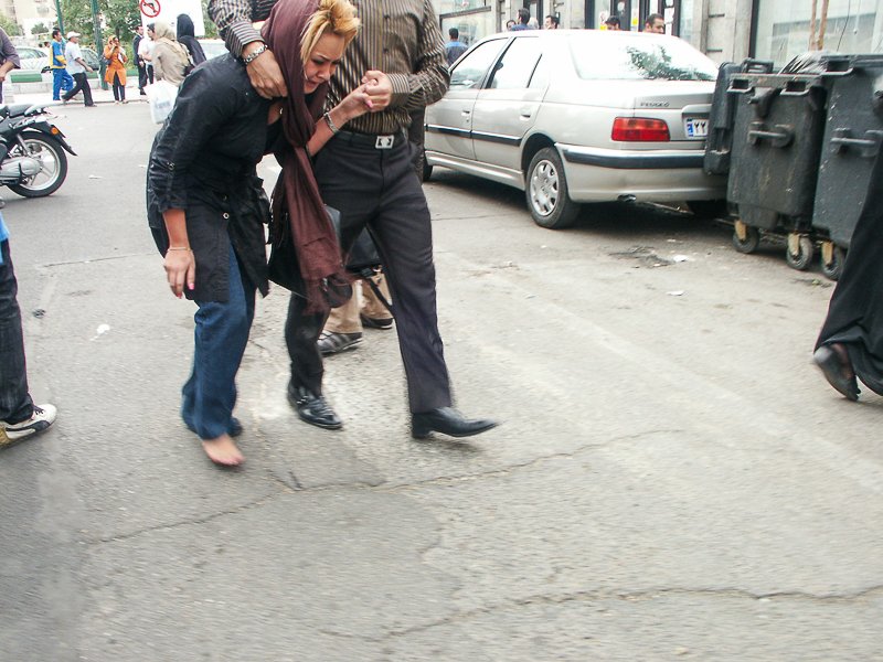 Editorial photograph from the Green Movement protests in Iran during 2009–2010, documenting public demonstrations, civic resistance, and everyday life under heightened security conditions. Part of a long-form documentary project by photographer Farha