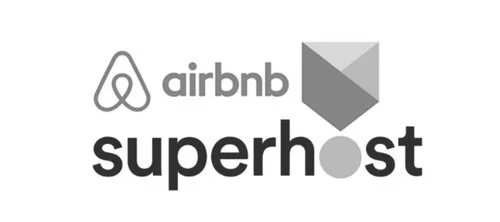 Airbnb Superhost logo with Airbnb icon, superhost text, and a geometric shape