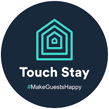 Logo with a stylized house outline and the text 'Touch Stay' with the hashtag #MakeGuestsHappy.
