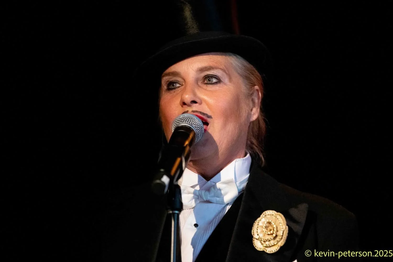 Vocalist Nichaud Fitzgibbon as Dexter Dambe Montgomery Brown