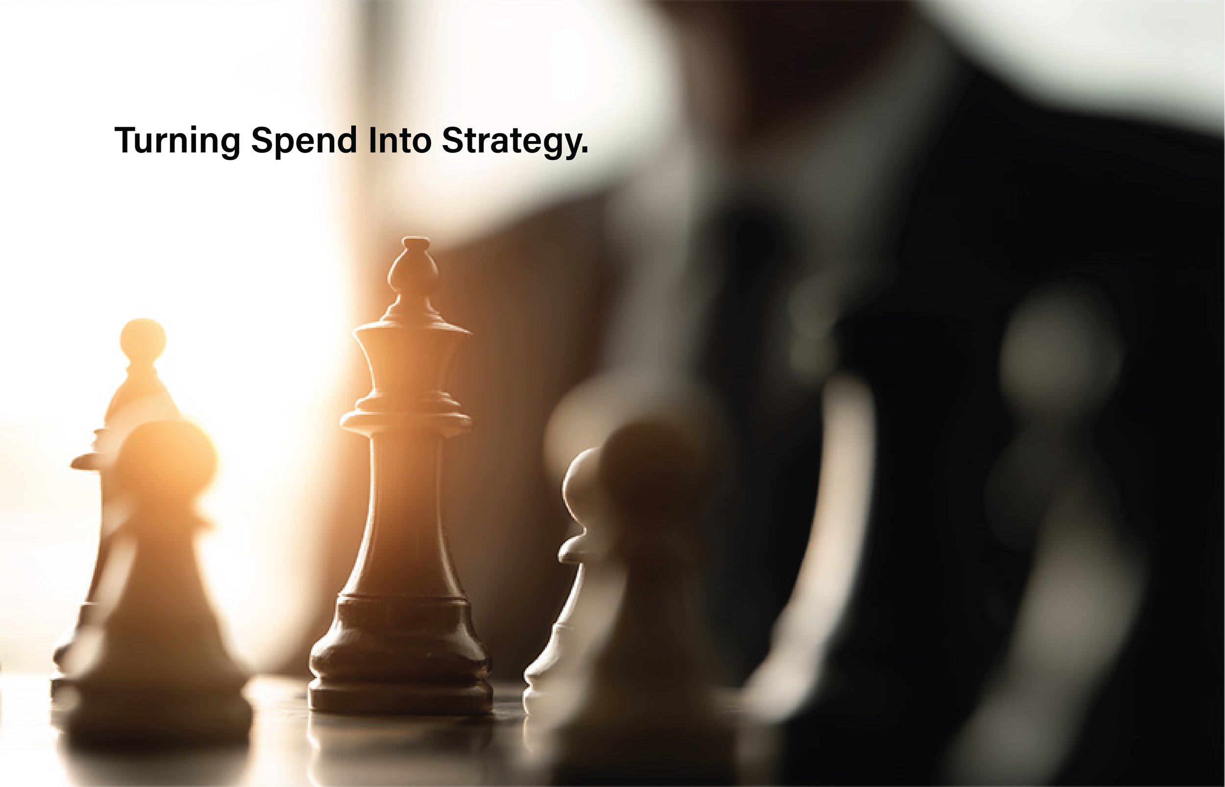 Chess pawns on a chessboard with the text 'Turning Spend Into Strategy.'