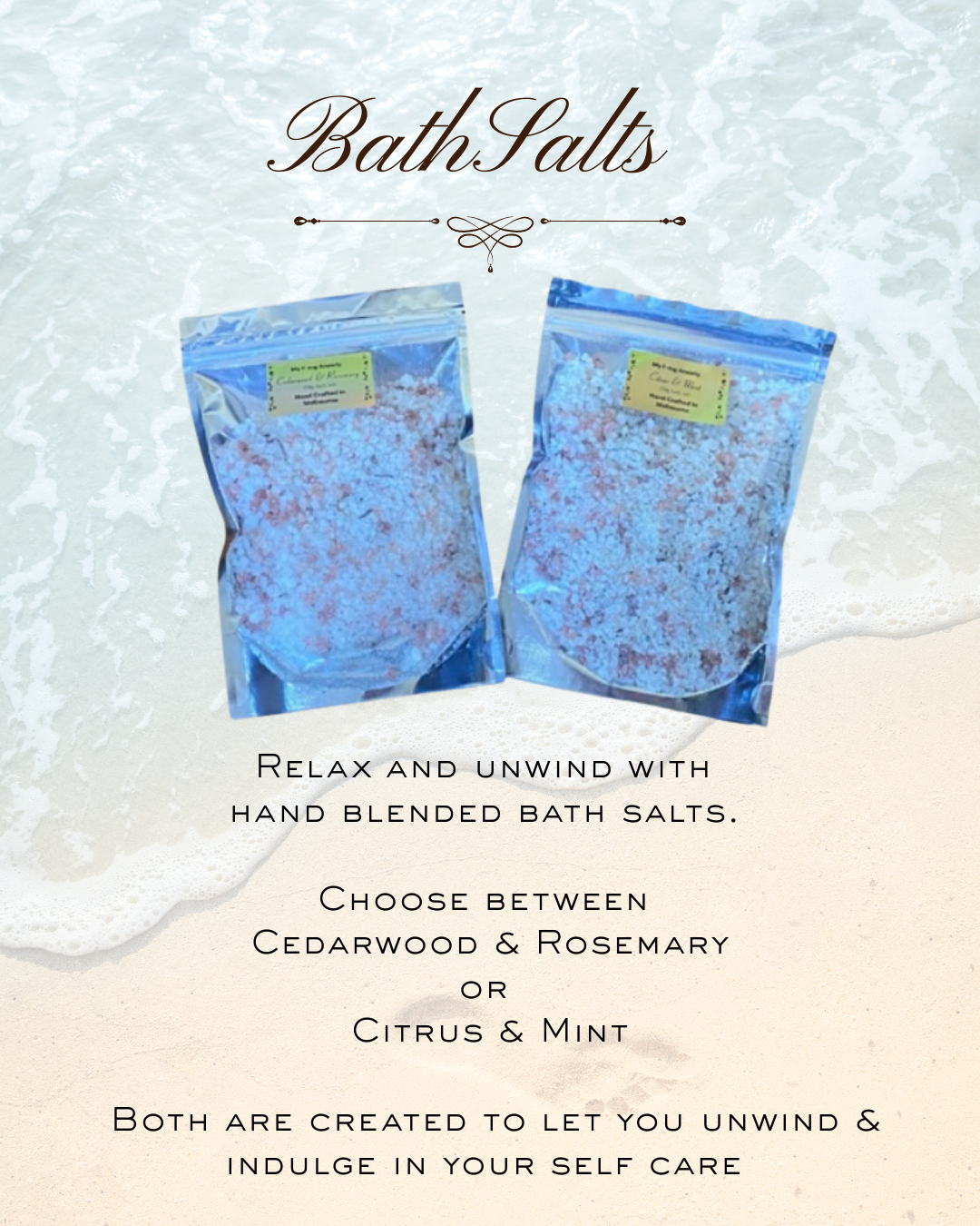 Two resealable pouches of bath salts on a sandy beach with foamy ocean waves in the background. Text overlay reads: 'Bath Salts. Relax and unwind with hand blended bath salts. Choose between cedarwood & rosemary or citrus & mint. Both are created to let you unwind & indulge in your self-care.'