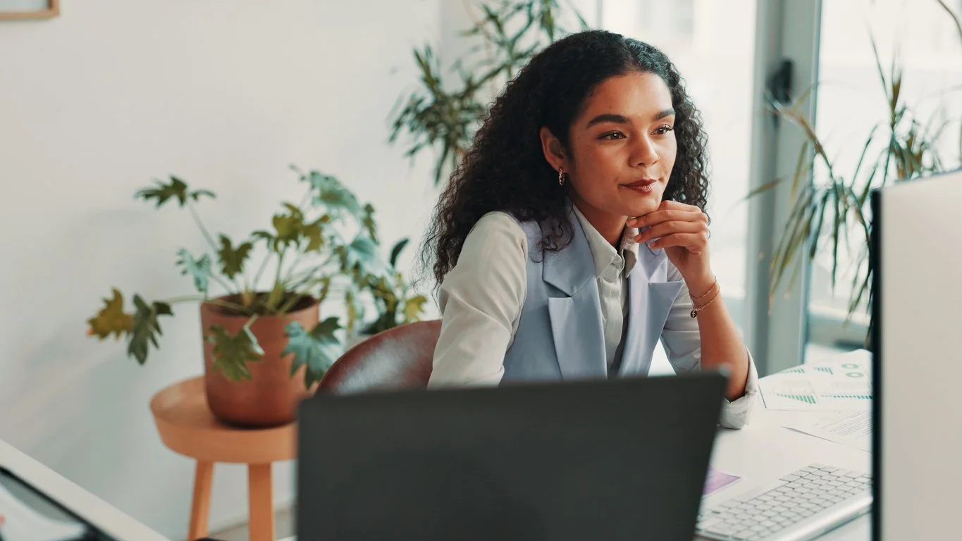 Woman in a home office during an online therapy session, teletherapy in Connecticut