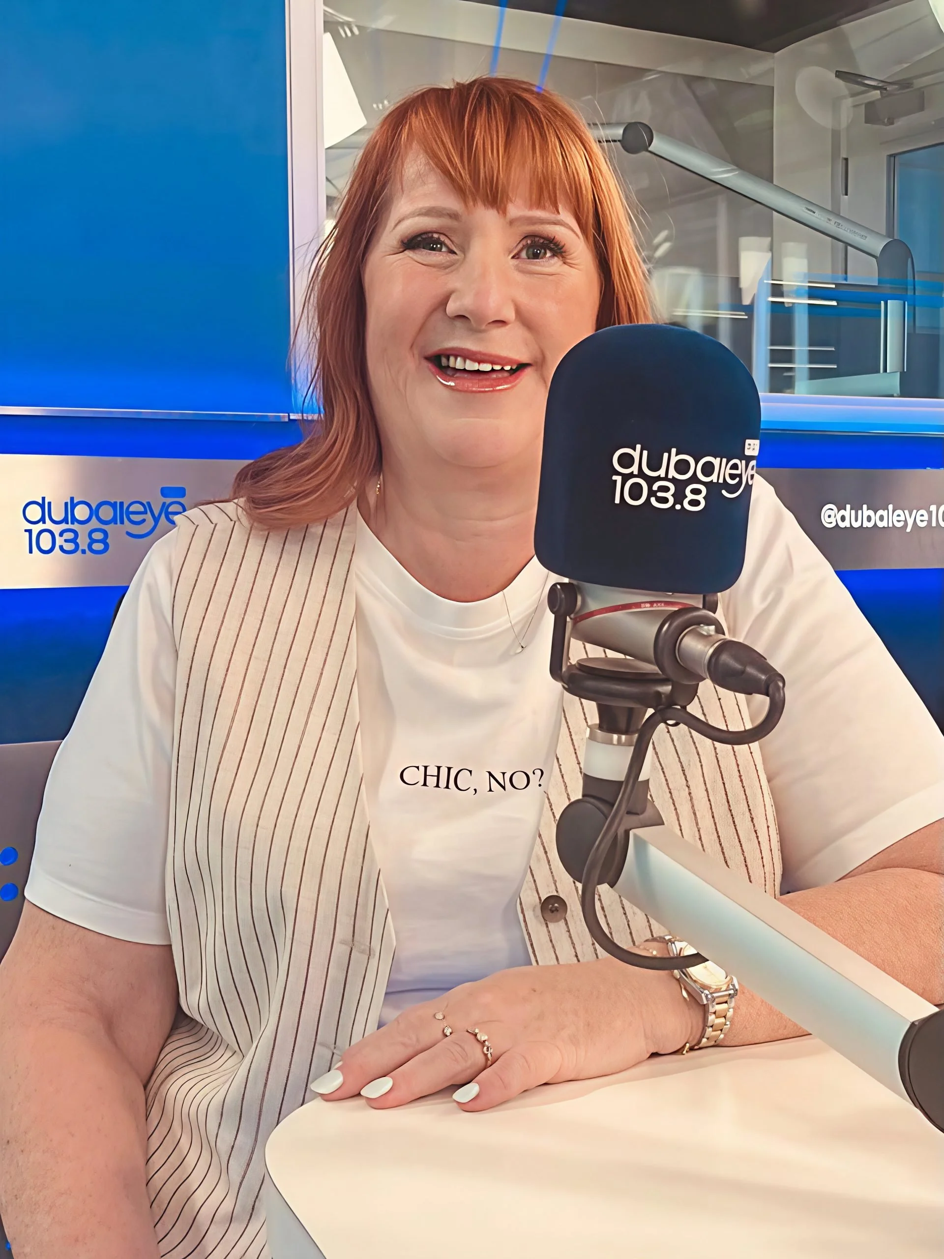 Anne with a mic at Dubai Eye