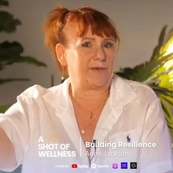 Anne being filmed doing a podcast