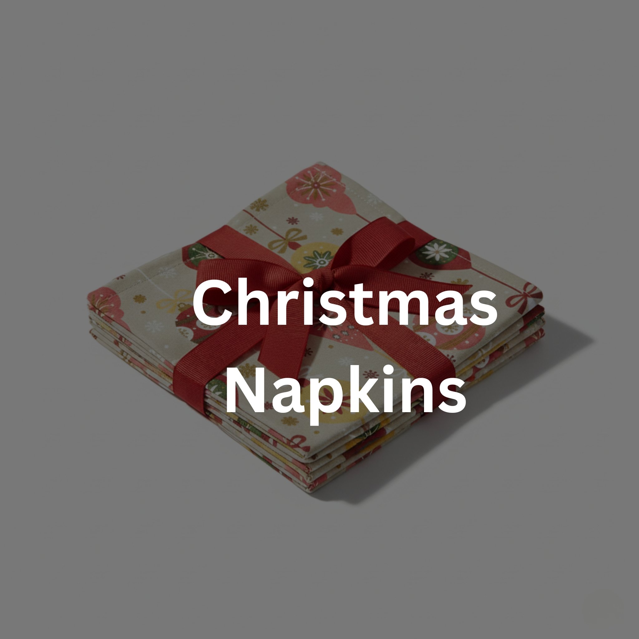 Stack of Christmas-themed napkins tied with a red ribbon.
