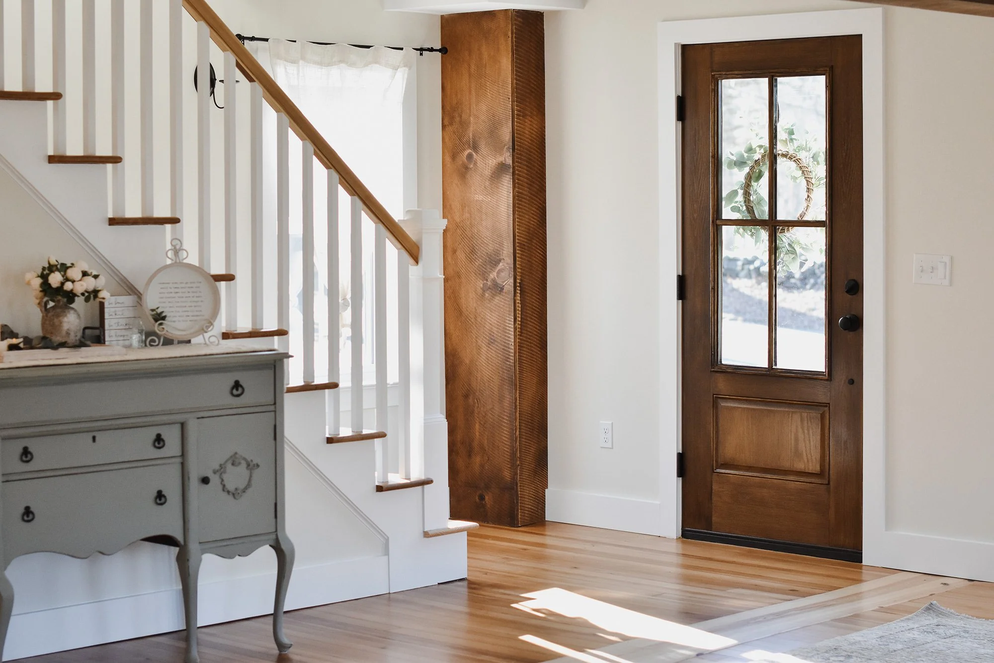 Restore farmhouse reclaimed wood beams and restored floors, antique dress and natural light puring through farmhosue windows
