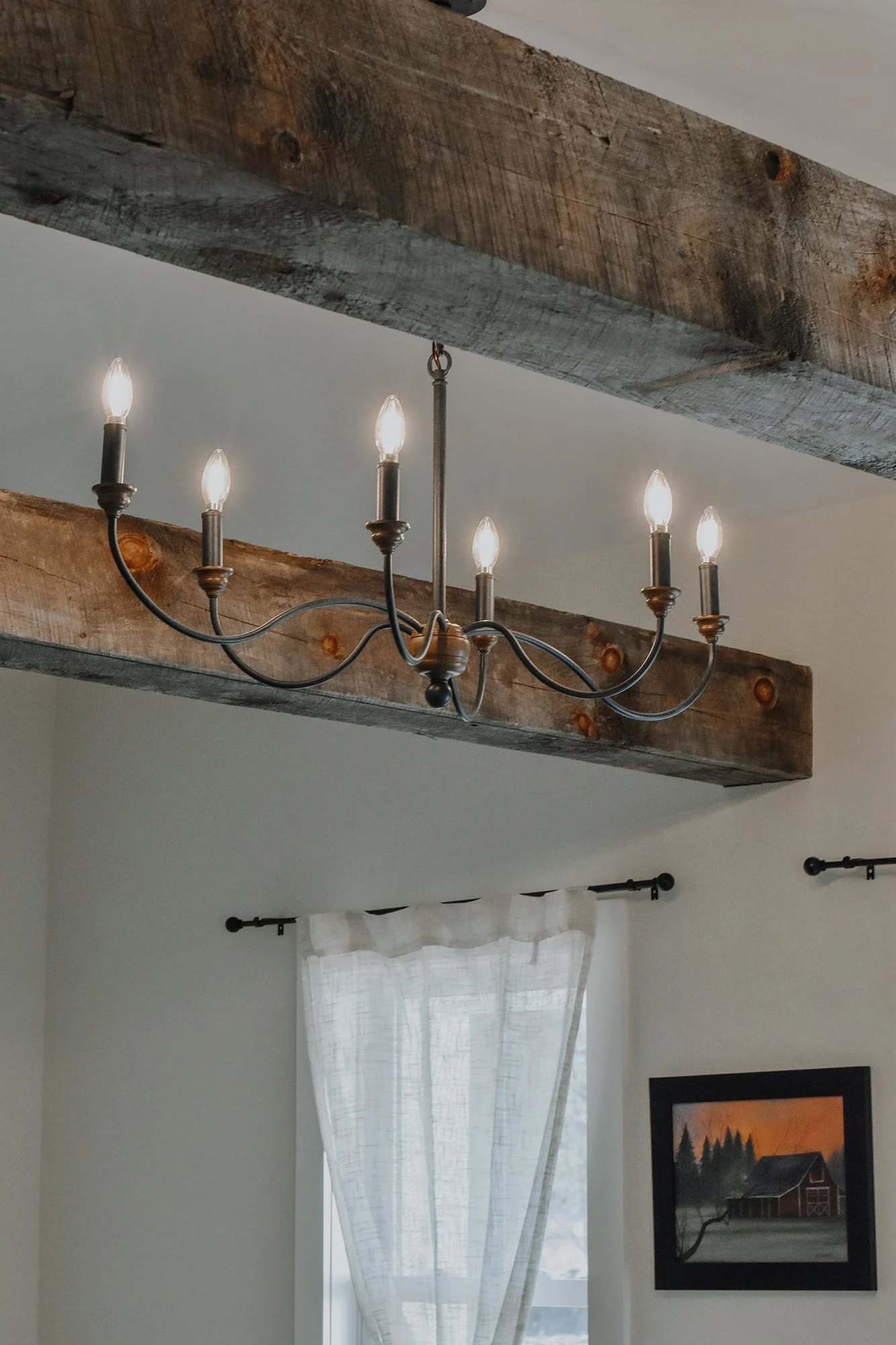 Farmhouse Antique Chandelier and Reclaimed Wood Beams