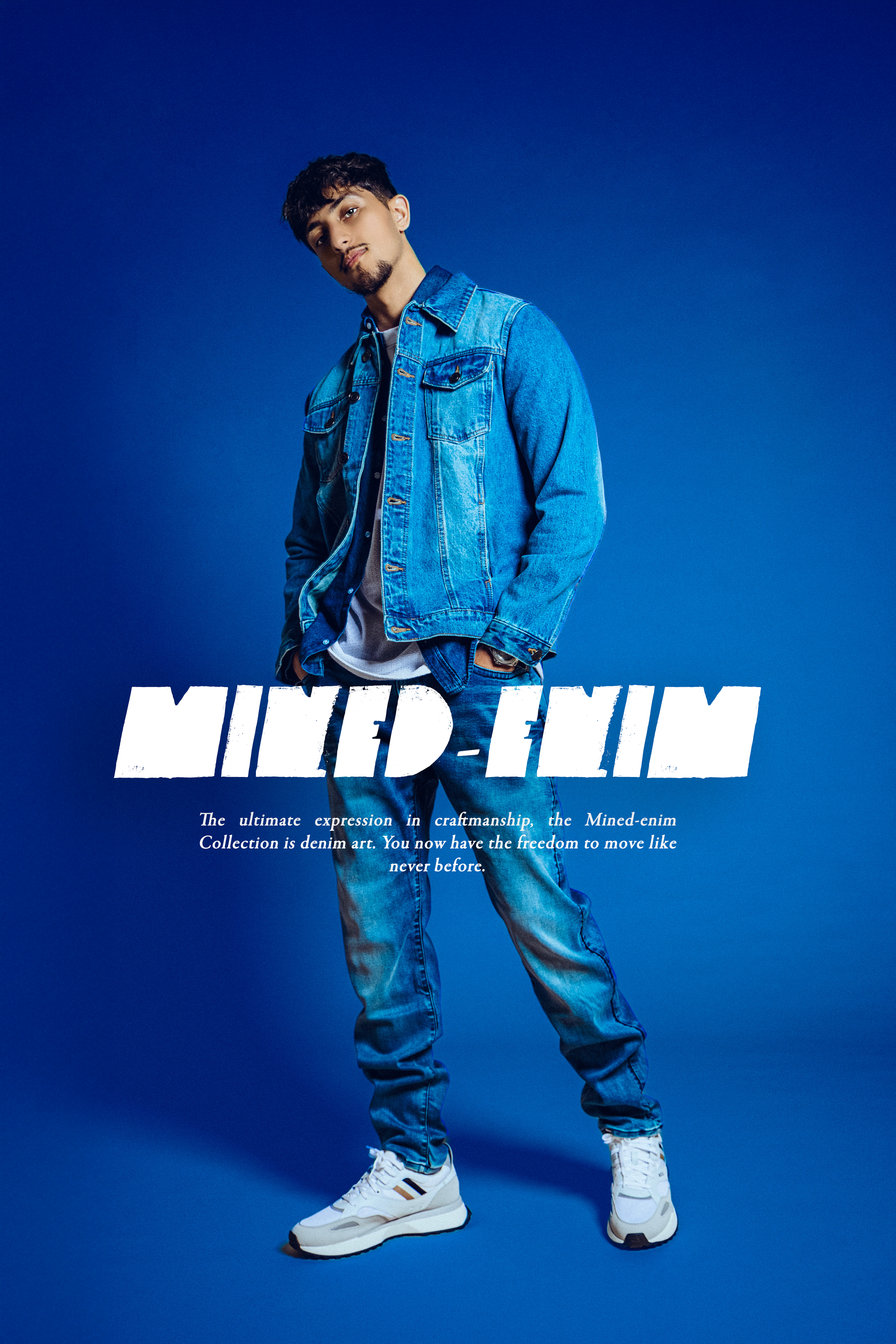 A young man wearing a denim jacket and jeans, standing against a blue background. Text overlays say "Mined-Em" and a description about denim craftsmanship and collection.